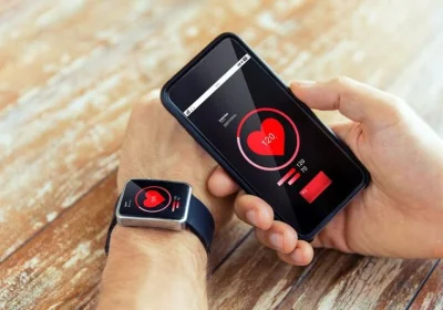 Which companies lead the market in wearable technology devices?